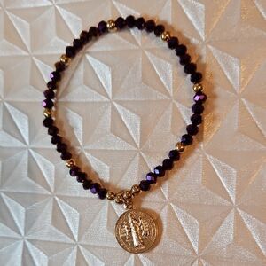 Purple and Gold Beaded Bracelet With St. Benedict Charm
